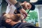 Bearded young man ready for shaving in the hair salon of a skilled barber