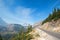 BEARHAT MOUNTAIN AT THE TOP OF LOGAN PASS ON THE GOING TO THE SUN HIGHWAY UNDER CIRRUS CLOUDS IN GLACIER NATIONAL PARK USA