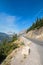 BEARHAT MOUNTAIN AT THE TOP OF LOGAN PASS ON THE GOING TO THE SUN HIGHWAY UNDER CIRRUS CLOUDS IN GLACIER NATIONAL PARK USA