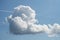 beatiful cumulo nimbus cloud .with paragliders on blue sky background