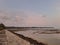 Beatiful landscape beach, breakwater, stone, sunset at linau beach, kaur, indonesia, south east asia