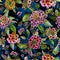 Beatiful lantana flowers with green leaves on black and blue background. Seamless floral pattern. Watercolor painting.