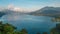 Beatiful view over the lake. Lake and mountain view from a hill, Buyan Lake, Bali. Timelapse. from left to right