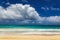 Beatiful Waimanalo beach with turquoise water and cloudy sky