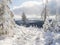 Beatiful winter landscape, view of Cakova vyhlidka viewpoint at fields, forest, villages and snowy spruce tree with snow