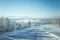 A beatiful winter scenery with a road. Woods in Norway.