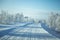 A beatiful winter scenery with a road. Woods in Norway.