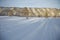 A beatiful winter scenery with a road. Woods in Norway.