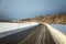 A beatiful winter scenery with a road. Woods in Norway.