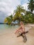 Beatiful young lady in a caribean beach