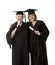 Beauitiful Caucasian mother and daughter in black graduation gowns