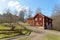 Beautful rural red cottage in the swedish village Rottle during spring