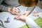 A beautician doing child manicure