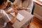 Beautician filing female clients nails at spa beauty salon