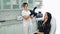 Beautician makes photo on camera of patient before cosmetic procedure, slow motion.