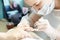 Beautician making hardware manicure. woman hands receiving nail procedure in beauty salon.