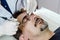 Beautician procedure cleansing face men