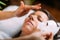 Beautician Putting Beauty Face Mask on Womanâ€™s Face