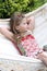 Beautifil blond child in hammock