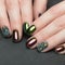 Beautifil Colorful manicure with rhinestone. Nail Design. Close-up