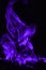 Beautifu purple fire flames on a black background.