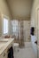 Beautiful 1930s style retro bathroom remodel with marble sink and white tile