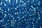 Beautiful abstract art texture background of blue confetti glitter