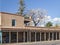 Beautiful adobe house with covered gallery in Sante Fe, New Mexico