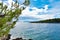 Beautiful Adriatic sea in Croatia. Green pine  rocks  blue water  sunny weather
