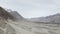 Beautiful aerial drone footage of a landscape of a valley in Ladakh. Beautiful mountain range covered in snow