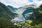 Beautiful aerial landscape view Geiranger village, harbor and fjord in More og Romsdal county in Norway.