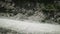 Beautiful aerial shot of a dusty road in north-west Italy. Scene. landscape of dry earthen road in mountains side view