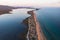 Beautiful aerial vibrant view of Korission Lake Lagoon landscape, Corfu island, Greece with pink flamingos flock, Ionian sea beach