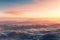 Beautiful aerial view above clouds at sunset