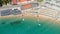 Beautiful aerial view of beach umbrellas in summer season, Cavoli Beach, Elba Island - Italy