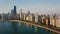 Beautiful aerial view of the Chicago, America in the morning. Drone flying away from the downtown, Michigan lake.