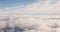 Beautiful Aerial View Of Clear Sky Over White Fluffy Clouds From Height Flight Of Plane