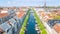 Beautiful aerial view of Copenhagen skyline from above, Nyhavn historical pier port and canal with color buildings and boats