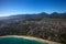 Beautiful aerial view of Kailua Beach, Oahu Hawaii on the greener and rainier windward side of the island.