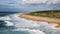 Beautiful aerial view of the large and deserted beach in small town Nazare, Portugal. Beautiful huge waves, sandy beach