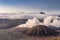 Beautiful aerial view of Mount BROMO with eruption and cloud background