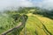 Beautiful aerial view of rice paddy field in Bo Kluea District Small village nestled in forested northern valley of pure air and