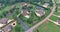 A beautiful aerial view of a roof homes of a small American town in the summertime in South Carolina, the United States