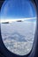 Beautiful aerial view seen through window of flying aeroplane