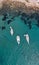 Beautiful aerial view of three moored yachts