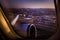 Beautiful aerial view through window of commercial airplane