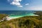 Beautiful aerial viewpoint tropical paradise Thailand island sea beach bay in the ocean and mountain forest with cloudy day sky