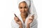 beautiful african american woman in bathrobe and towel holding lipstick and mirror,