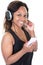 Beautiful African American young woman joyful listening to music on mobile phone