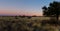 Beautiful african savannah landscape after sunset with afterglow